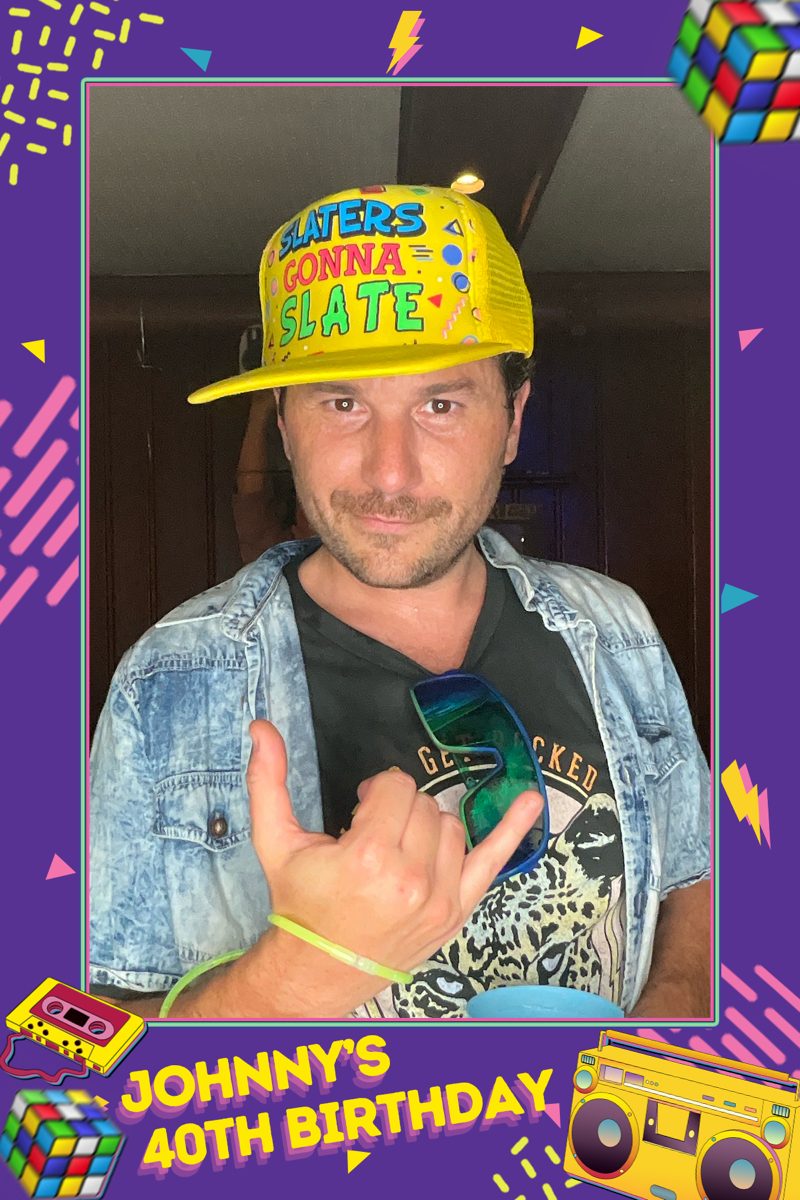 A custom-branded photo booth print from a 1990s-themed 40th birthday